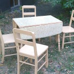 antique drop-leaf table and chairs
