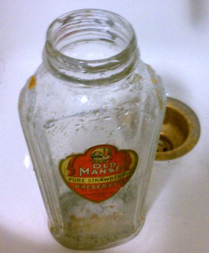 cleaning old preserves jar bottle