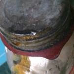 leaking lid on vintage preserves bottle