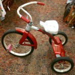 vintage red and white tricycle