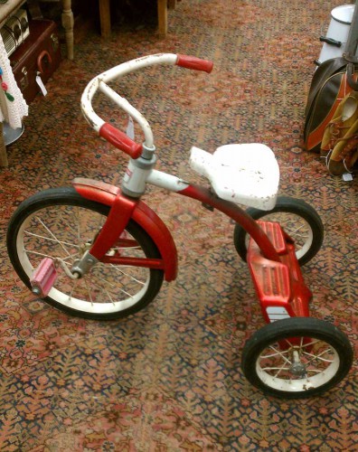 vintage red and white tricycle