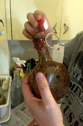 derek dripping sealing wax on spirit bottles